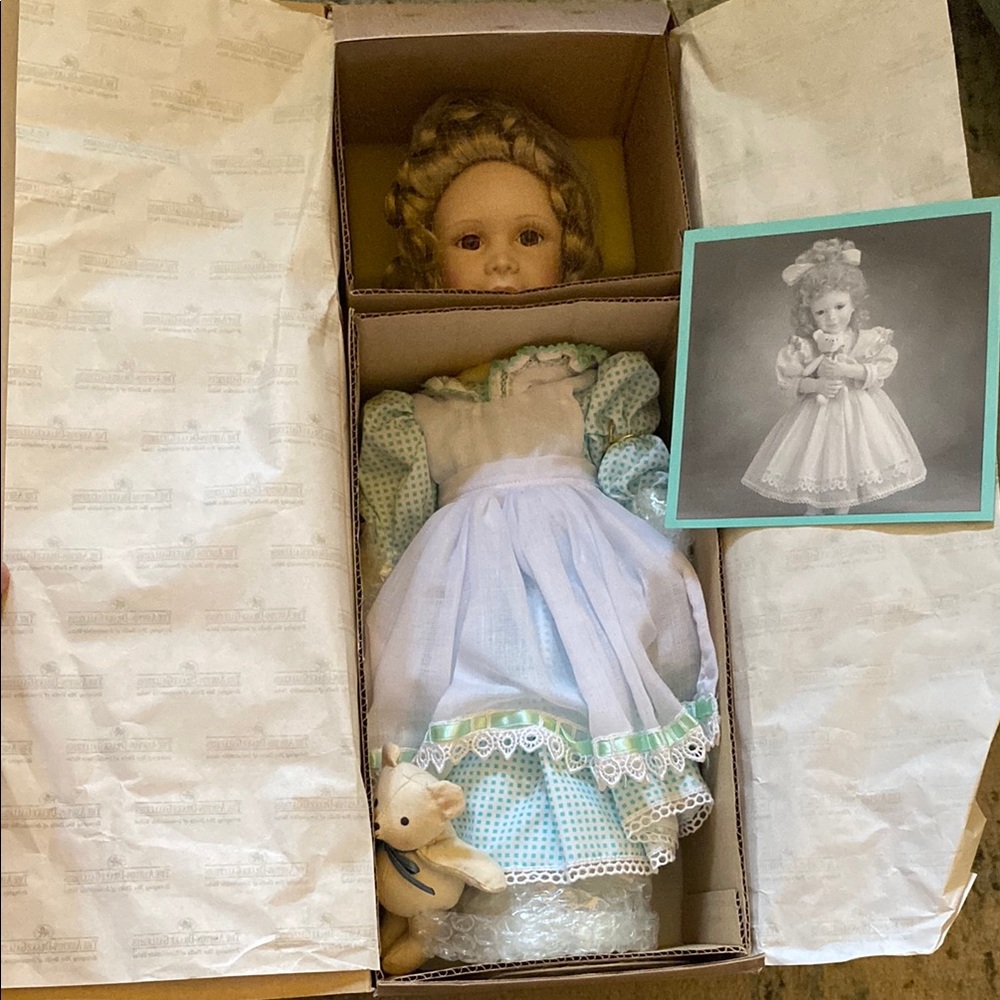 Porcelain Doll with Blue and White Dress